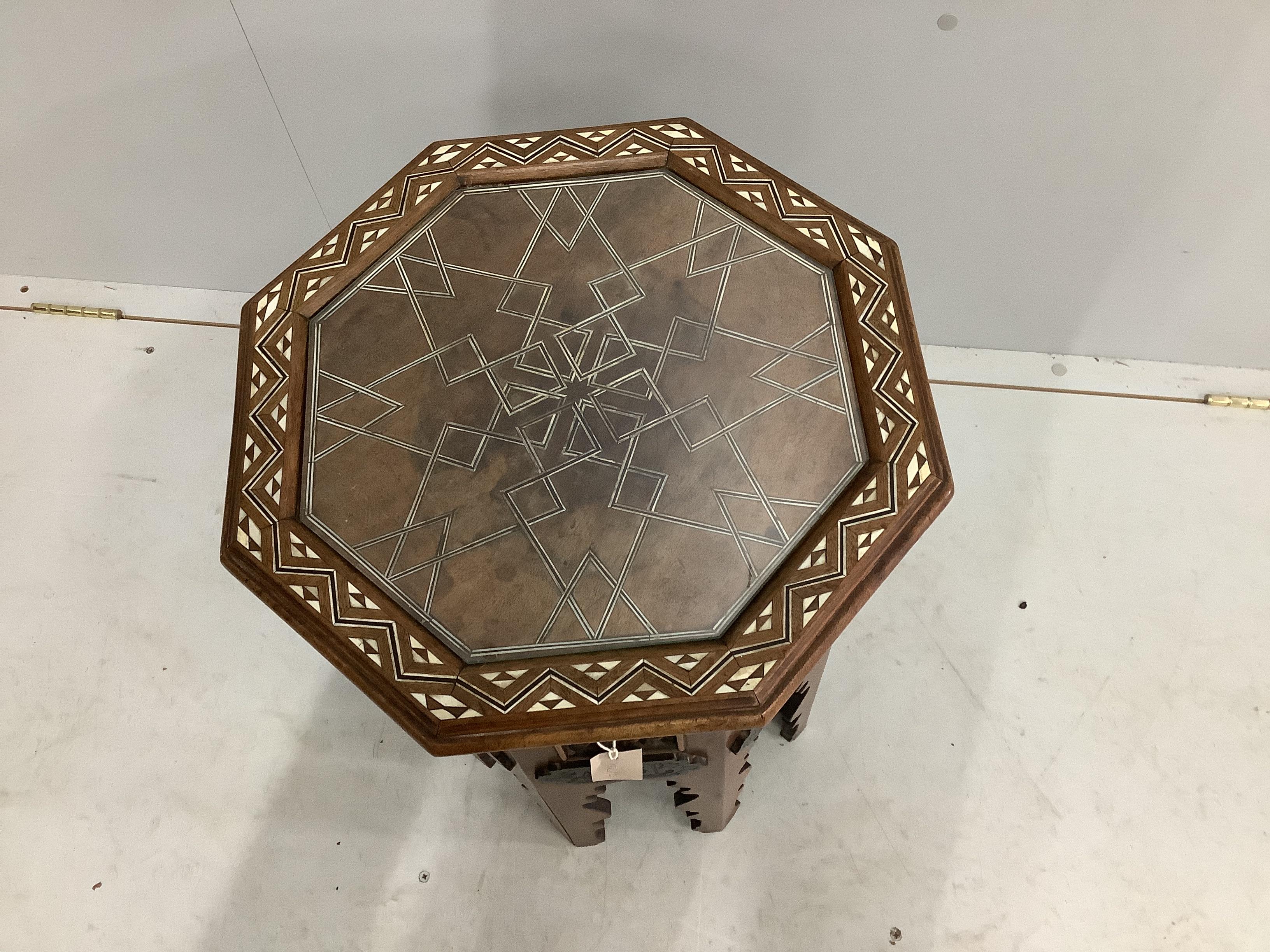 A Syrian bone inlaid octagonal occasional table, width 40cm, height 56cm